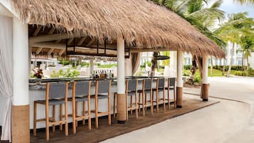 7 bars/lounges, 3 poolside bars, swim-up bar, beach bar