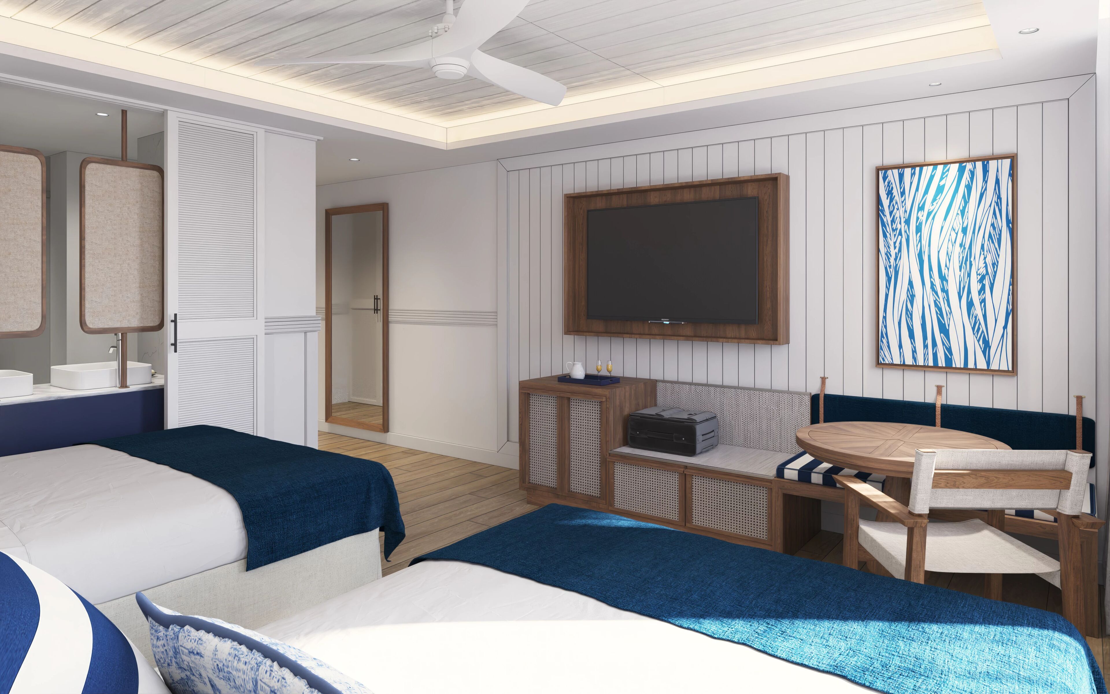 A hotel room with two beds, a TV, a seating area, and a large window.
