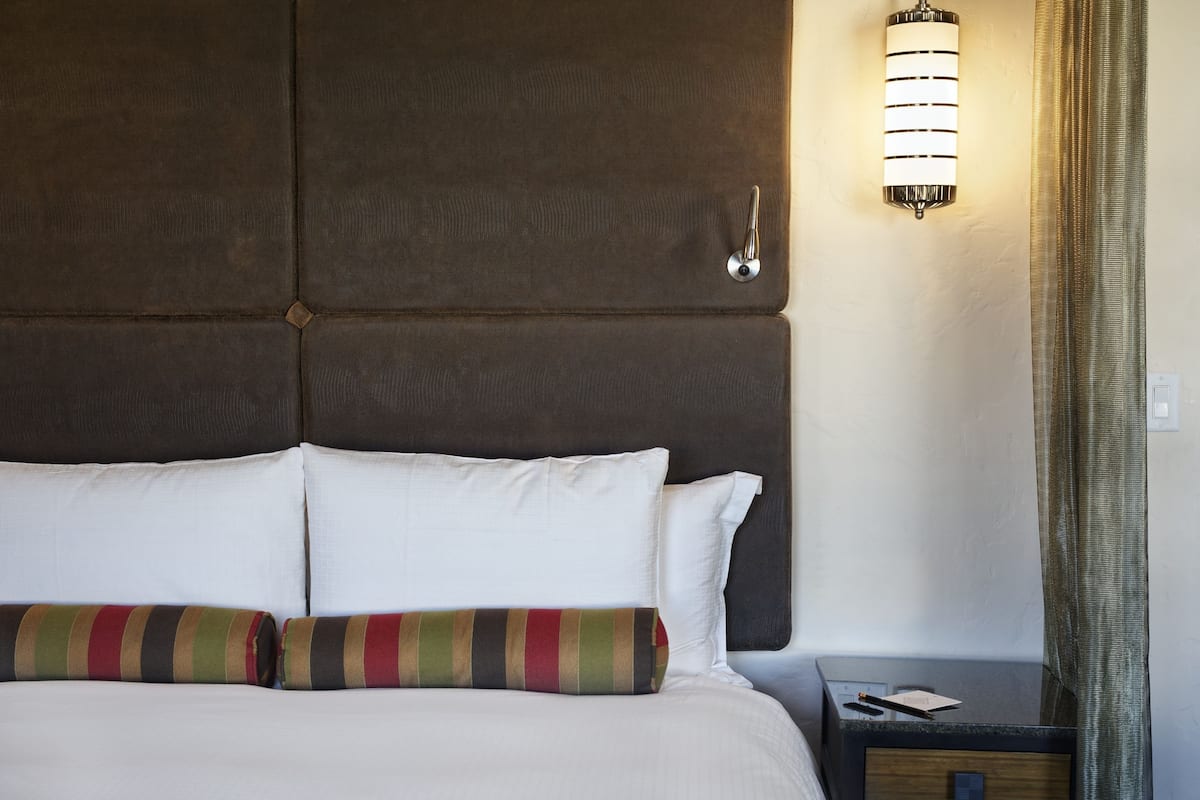 Premium bedding, down duvets, pillow-top beds, in-room safe