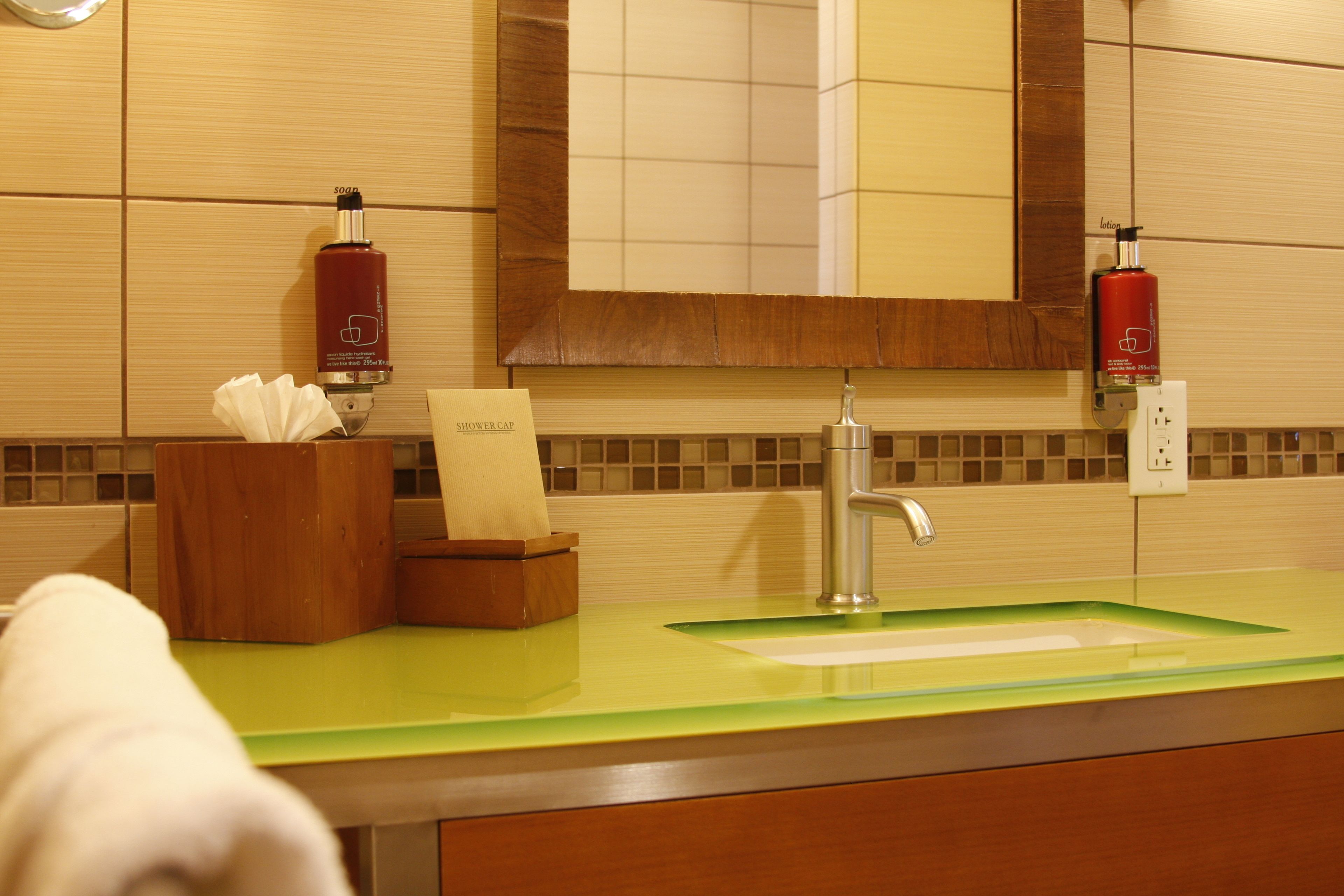 combined shower/bathtub, designer toiletries, hair dryer, bathrobes