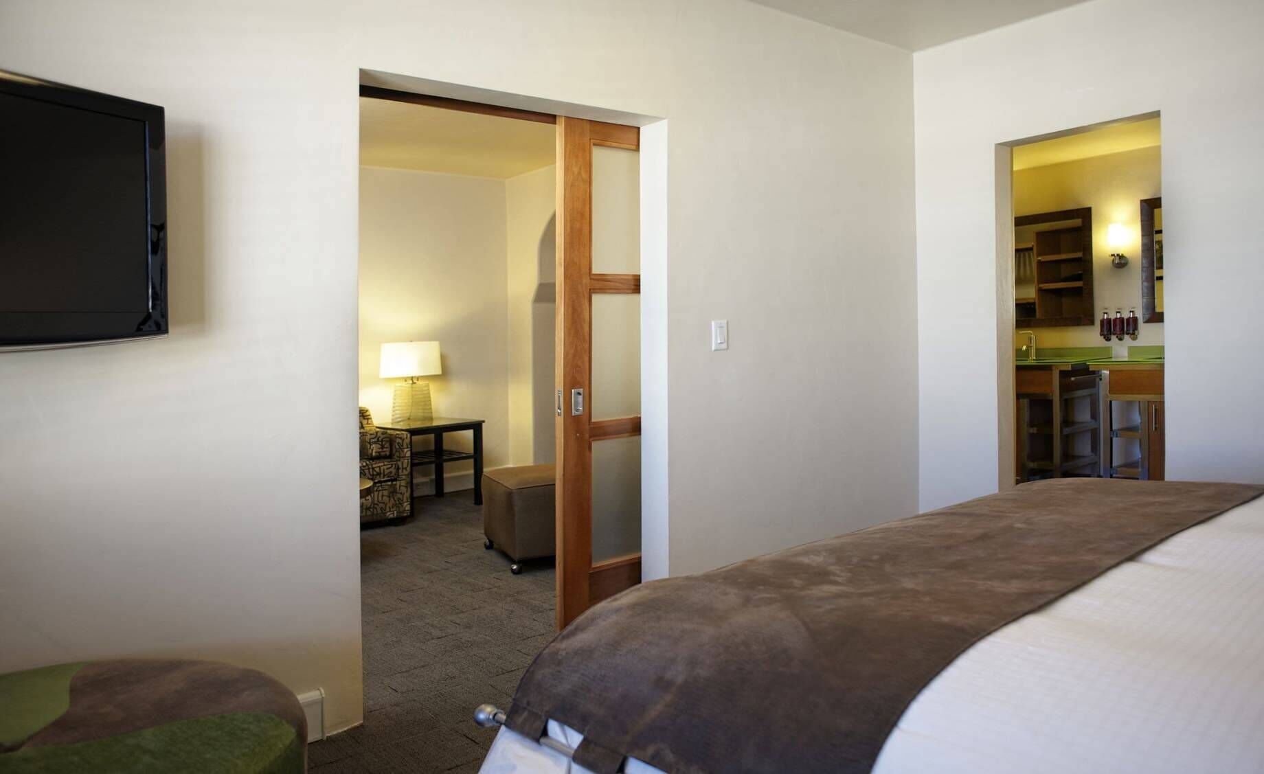 Premium bedding, down comforters, pillowtop beds, in-room safe