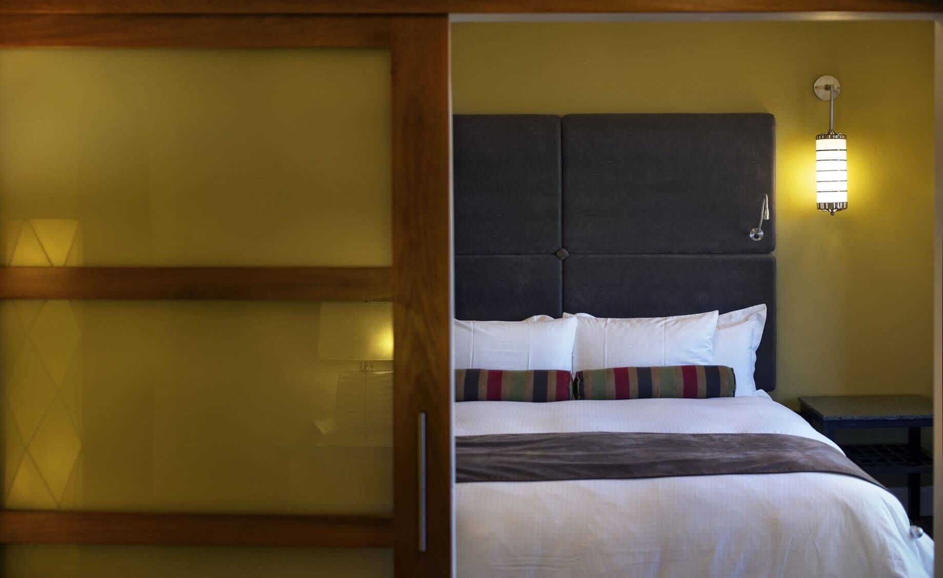 Premium bedding, down comforters, pillowtop beds, in-room safe