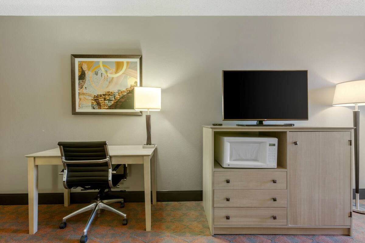 desk, laptop workspace, iron/ironing board, free cots/infant beds