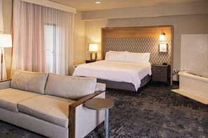 Suite, 1 King Bed, Jetted Tub | Blackout drapes, iron/ironing board, WiFi, bed sheets