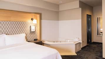 Suite, 1 King Bed, Jetted Tub | Blackout curtains, iron/ironing board, WiFi, bed sheets