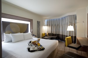 Premium bedding, down comforters, in-room safe, desk