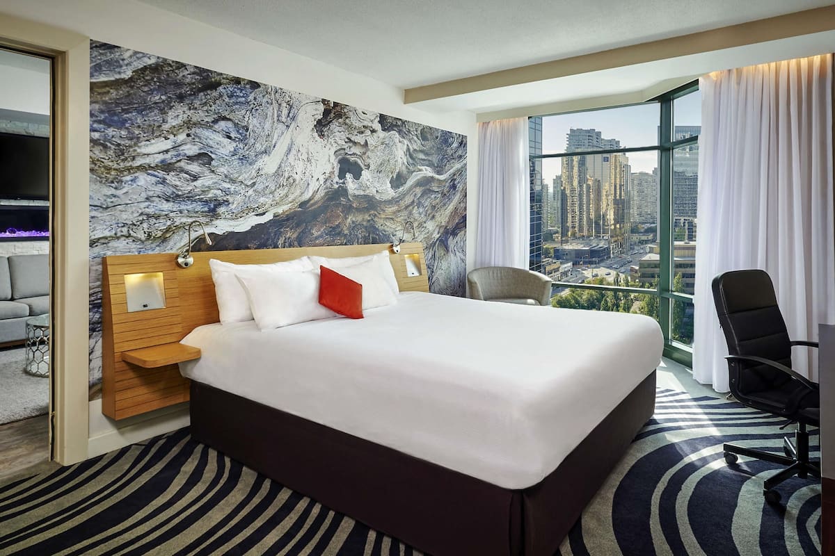 Suite, 1 King Bed | Premium bedding, down comforters, in-room safe, desk