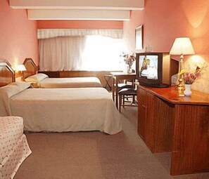 Down comforters, memory foam beds, minibar, in-room safe