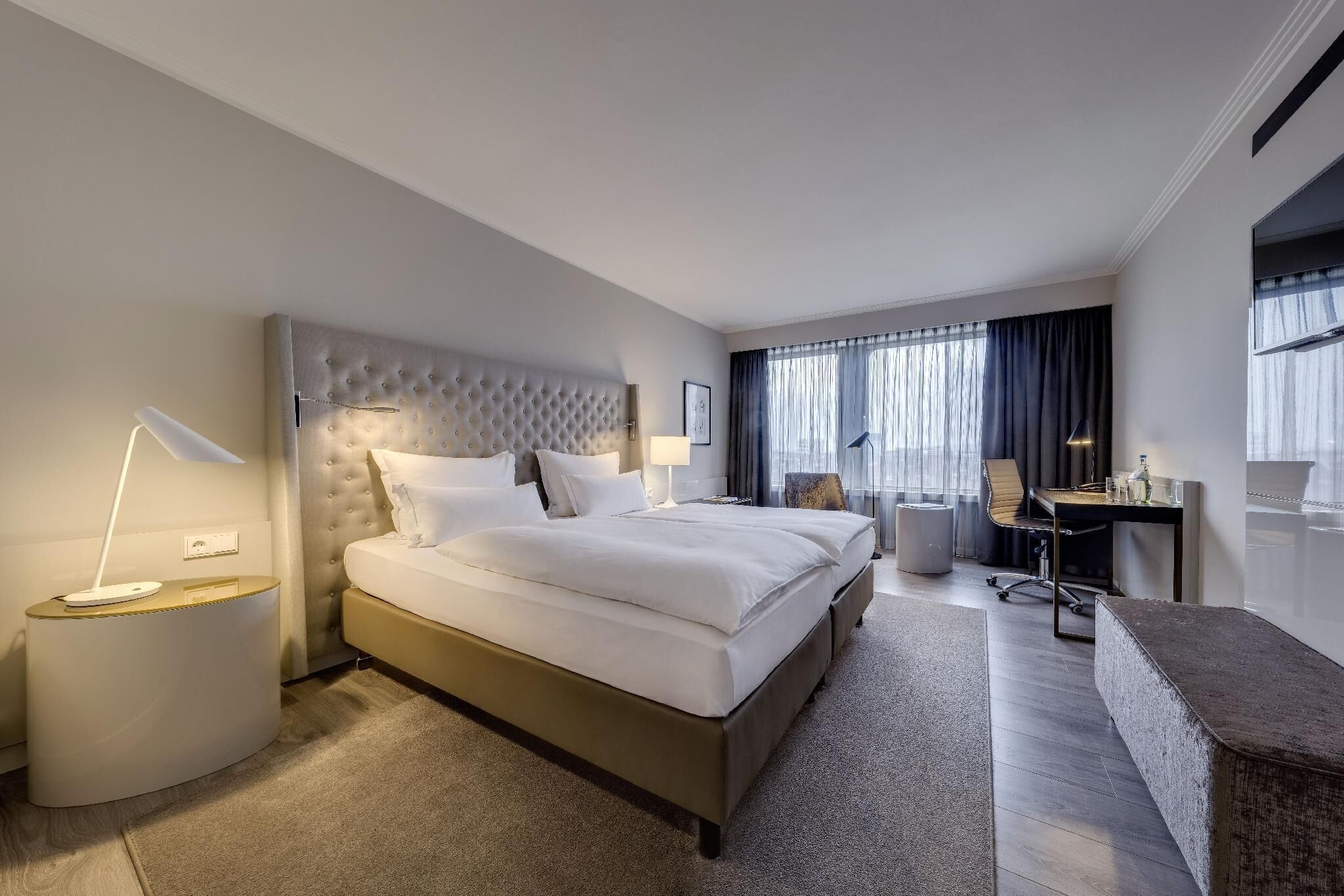 Premium bedding, in-room safe, blackout curtains, soundproofing
