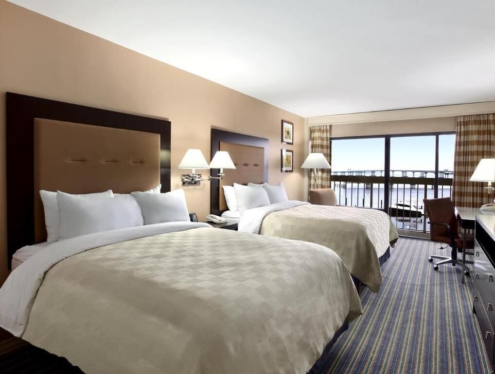 Premium bedding, down comforters, pillowtop beds, in-room safe