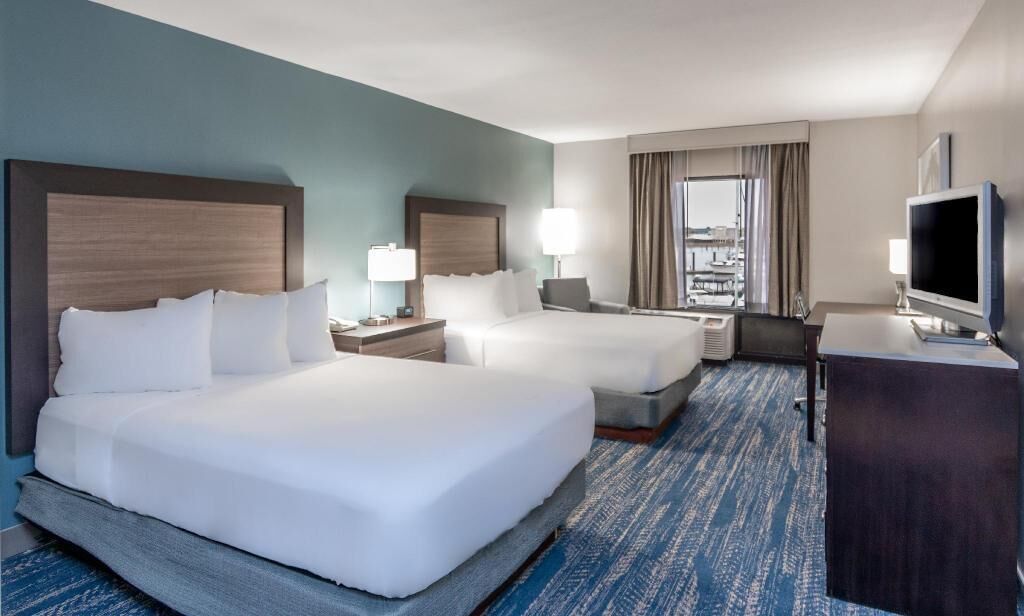 Premium bedding, down duvets, pillow-top beds, in-room safe