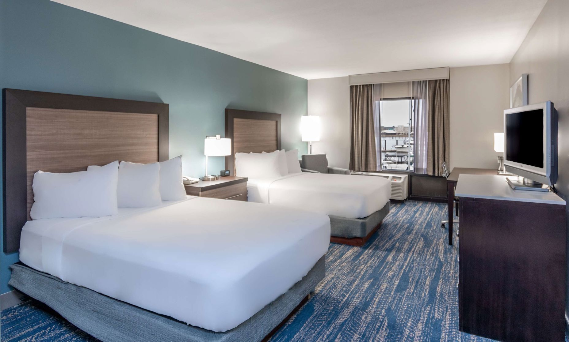 Premium bedding, down duvets, pillow-top beds, in-room safe