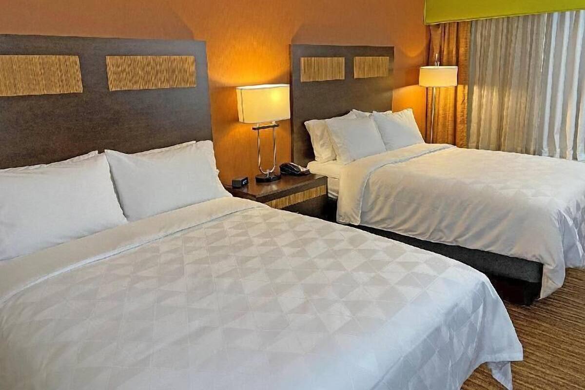 Desk, laptop workspace, iron/ironing board, travel crib