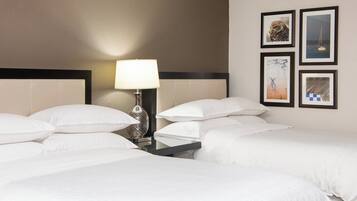 Premium bedding, down comforters, pillowtop beds, in-room safe