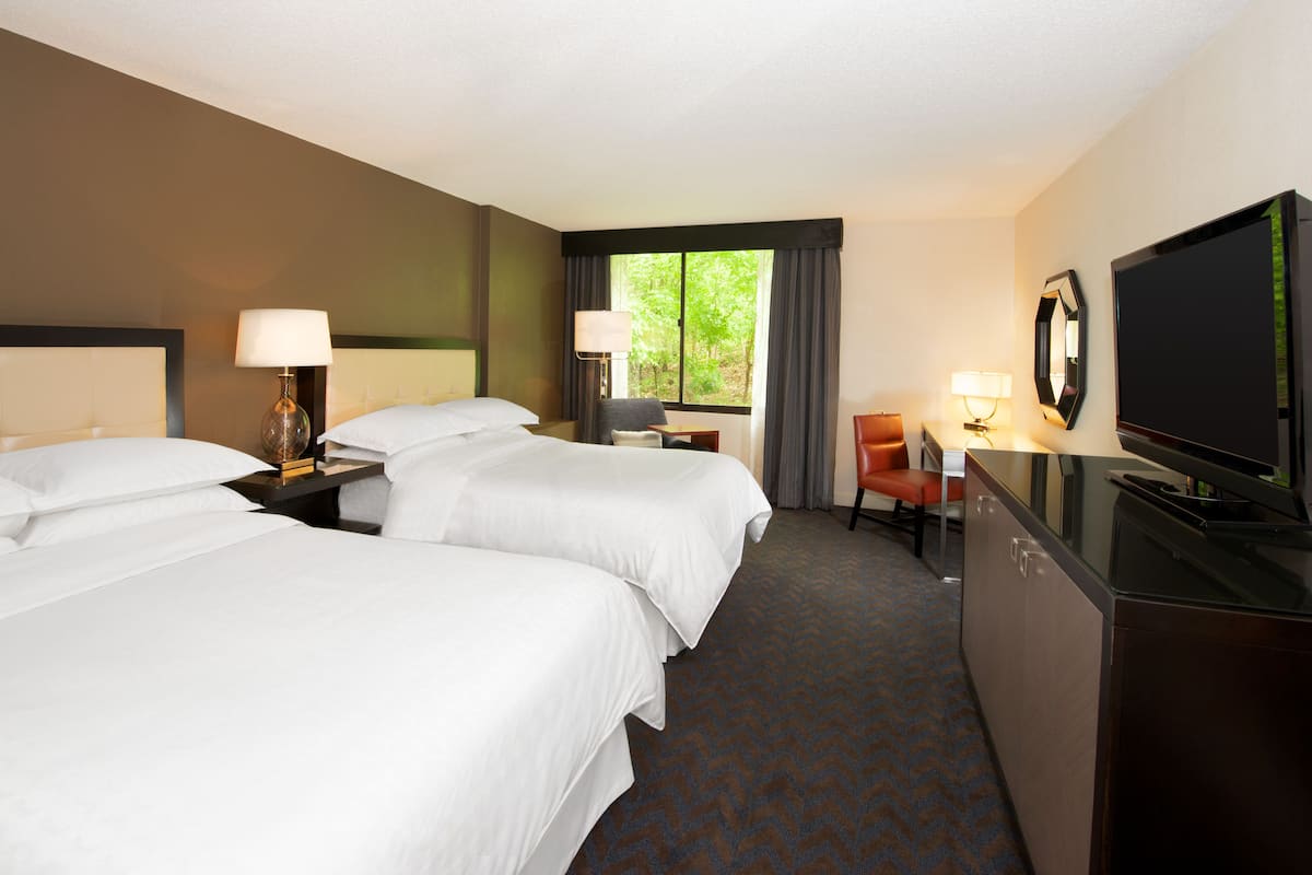 Premium bedding, down comforters, pillowtop beds, in-room safe