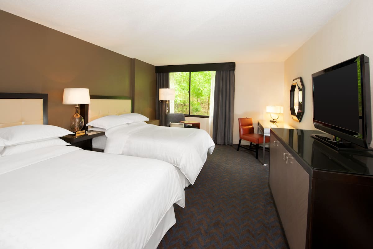 Premium bedding, down duvets, pillow-top beds, in-room safe