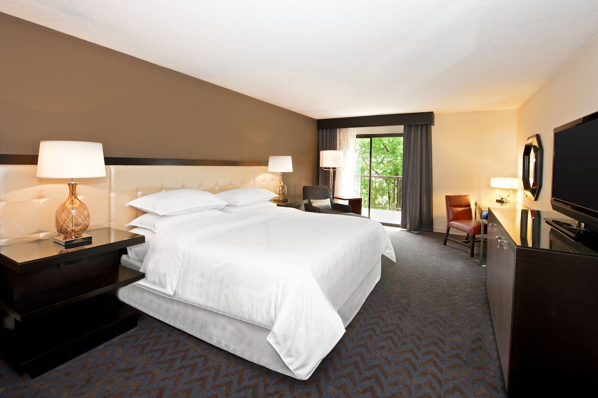 Premium bedding, down duvets, pillow-top beds, in-room safe
