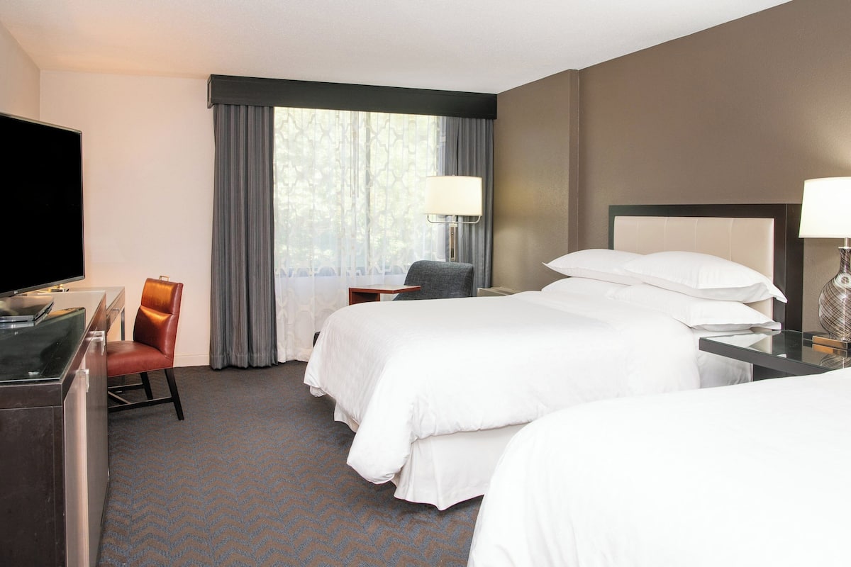 Premium bedding, down duvets, pillow-top beds, in-room safe