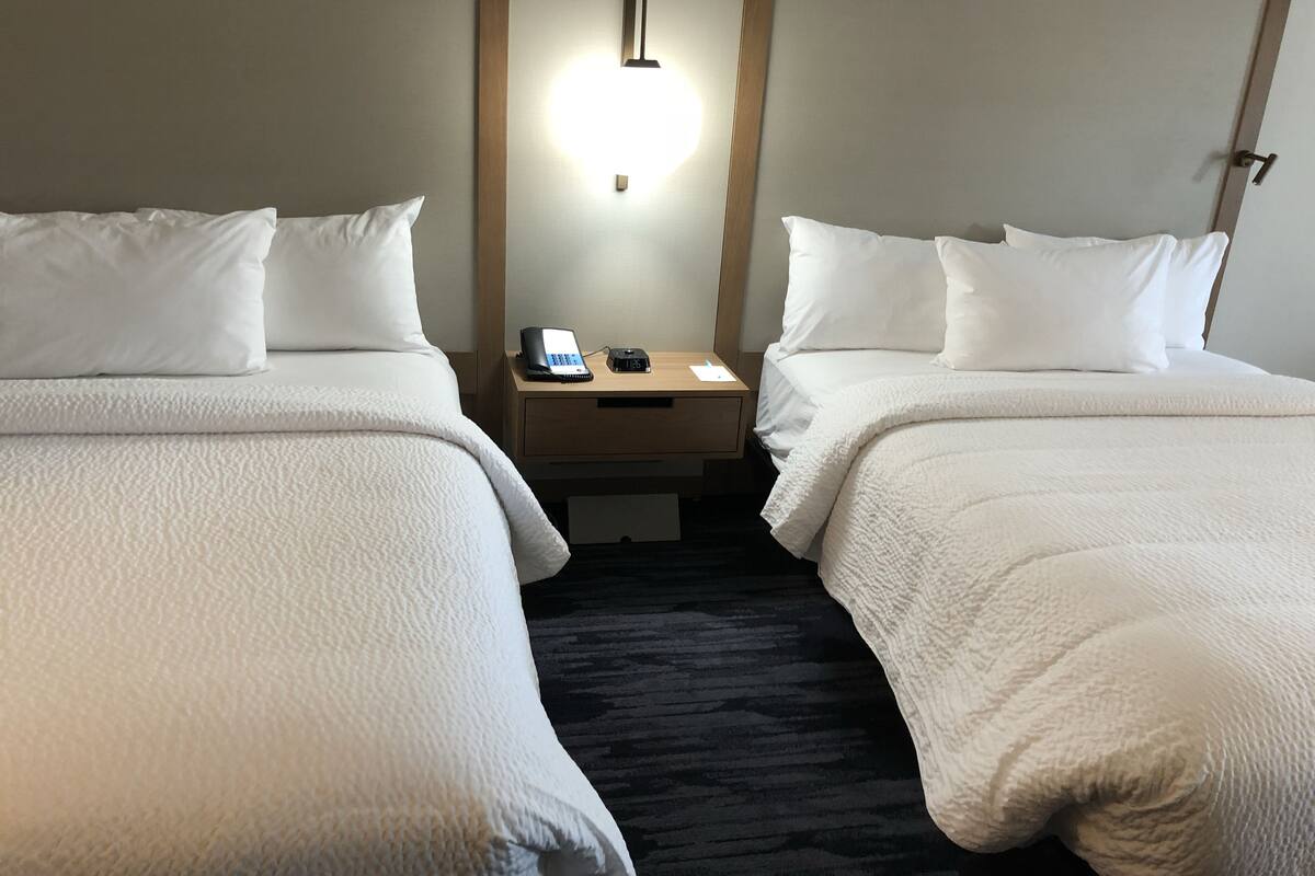 suite, multiple beds, non smoking | 1 bedroom, desk, laptop workspace, iron/ironing board