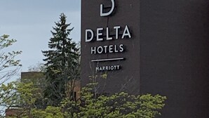 A Delta Hotels Marriott sign on a building.