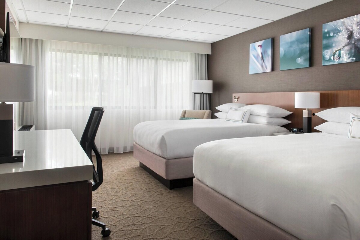 Premium bedding, down comforters, desk, blackout drapes