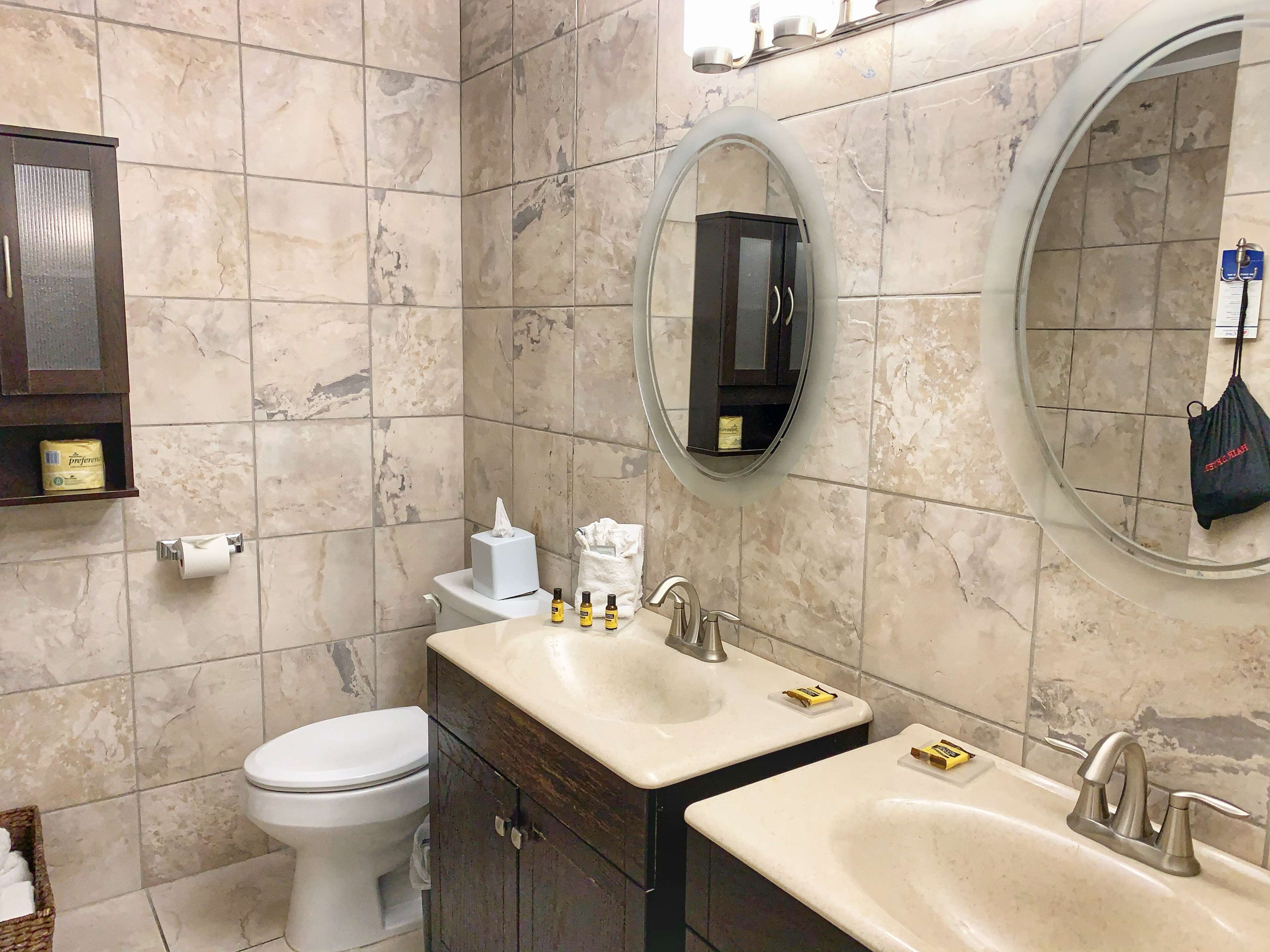 shower, designer toiletries, hair dryer, towels