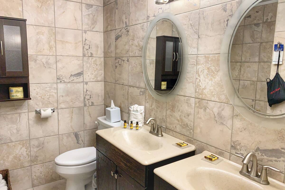 shower, designer toiletries, hair dryer, towels