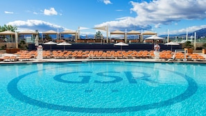 Outdoor pool, a heated pool, pool cabanas (surcharge), pool umbrellas