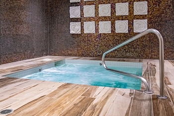 Couples treatment rooms, sauna, hot tub, steam room, body treatments at Grand Sierra Resort and Casino
