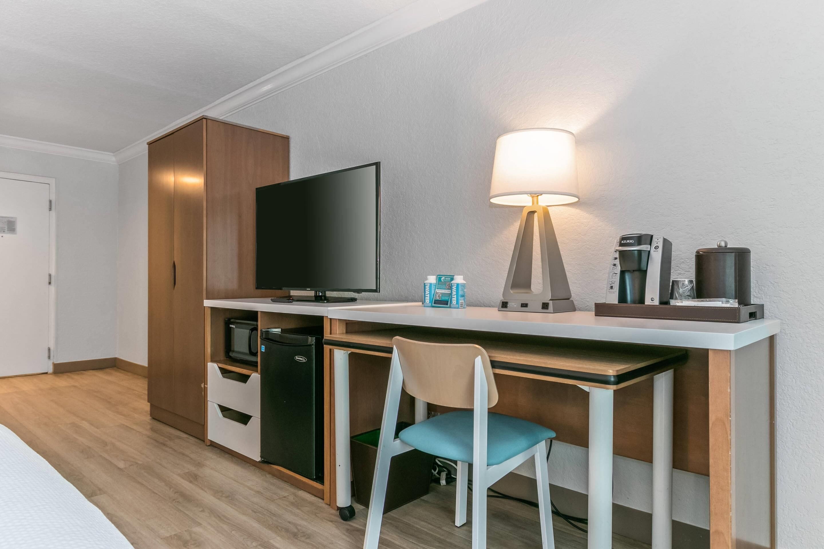 desk, blackout curtains, iron/ironing board, free cots/infant beds