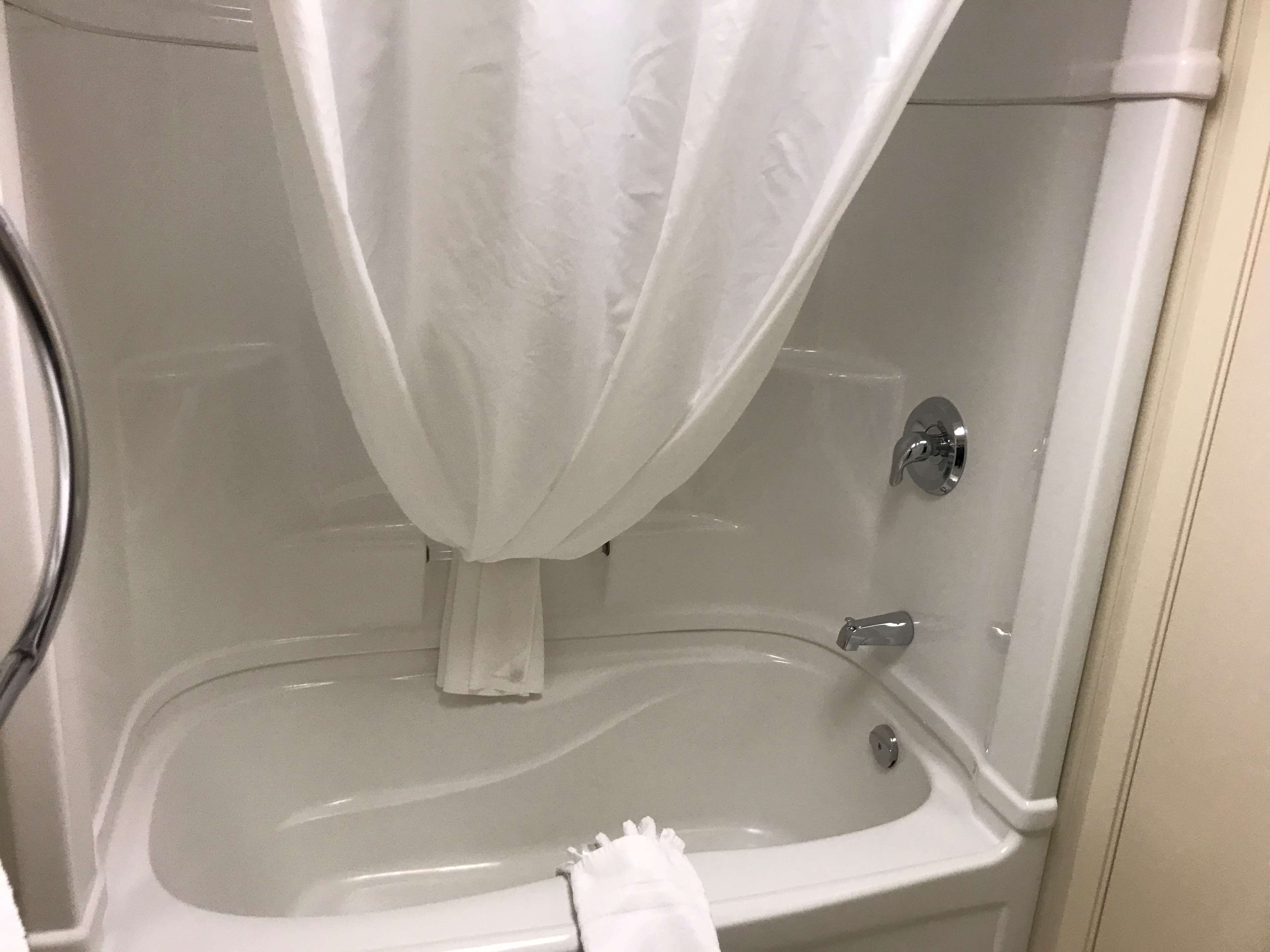 standard room, 2 queen beds, non smoking, refrigerator | bathroom | combined shower/bathtub, deep-soaking bathtub, free toiletries