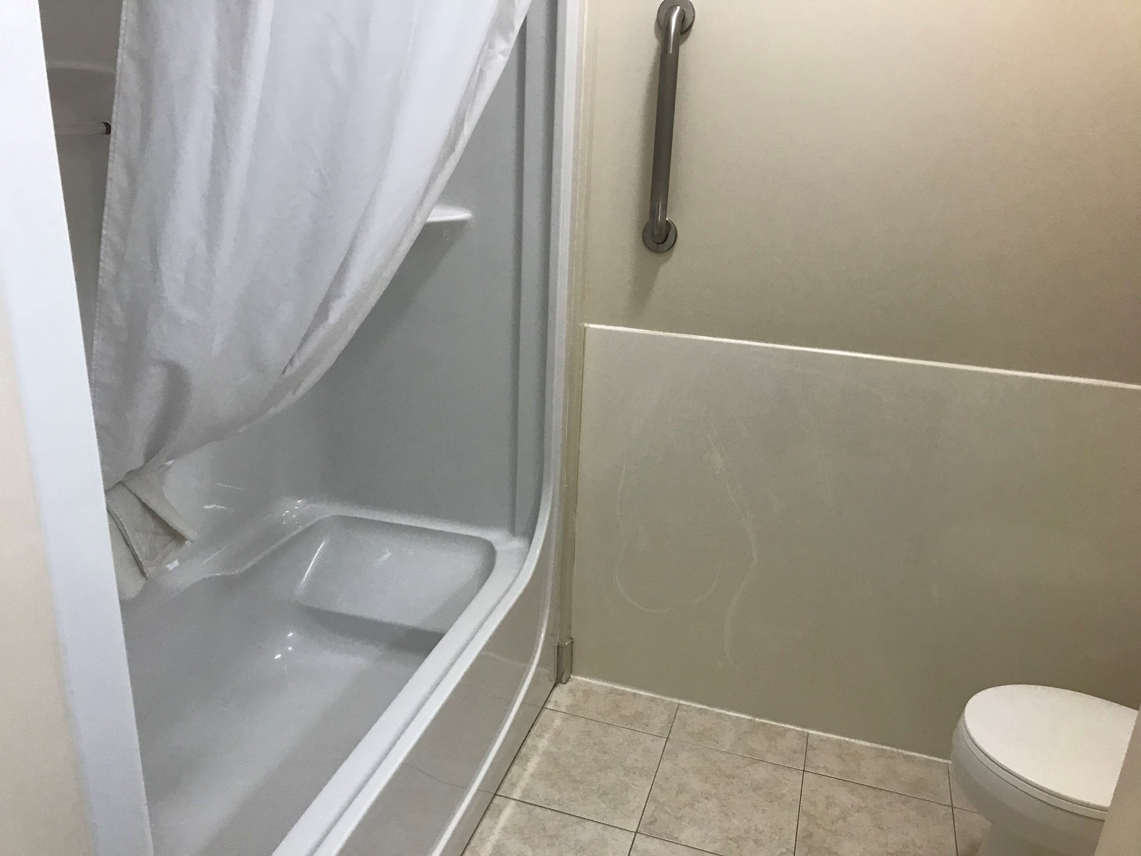 combined shower/bathtub, deep-soaking bathtub, free toiletries