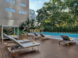 Outdoor pool, open 7:00 AM to 8:00 PM, pool umbrellas - voco Bangkok Surawong by IHG (Bangkok)