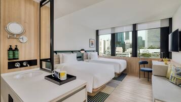 Deluxe Room | Minibar, in-room safe, desk, blackout drapes