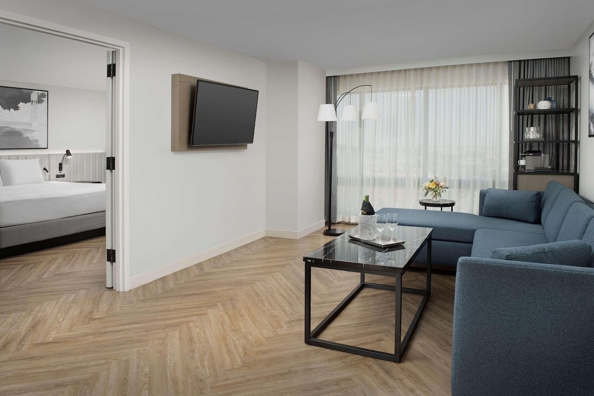 presidential suite, 1 king bed, non smoking, city view | premium bedding, in-room safe, desk, laptop workspace