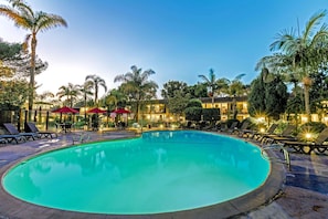 Outdoor pool, a heated pool, open 9 AM to 10:00 PM, pool loungers - Ramada by Wyndham Santa Barbara (Santa Barbara)