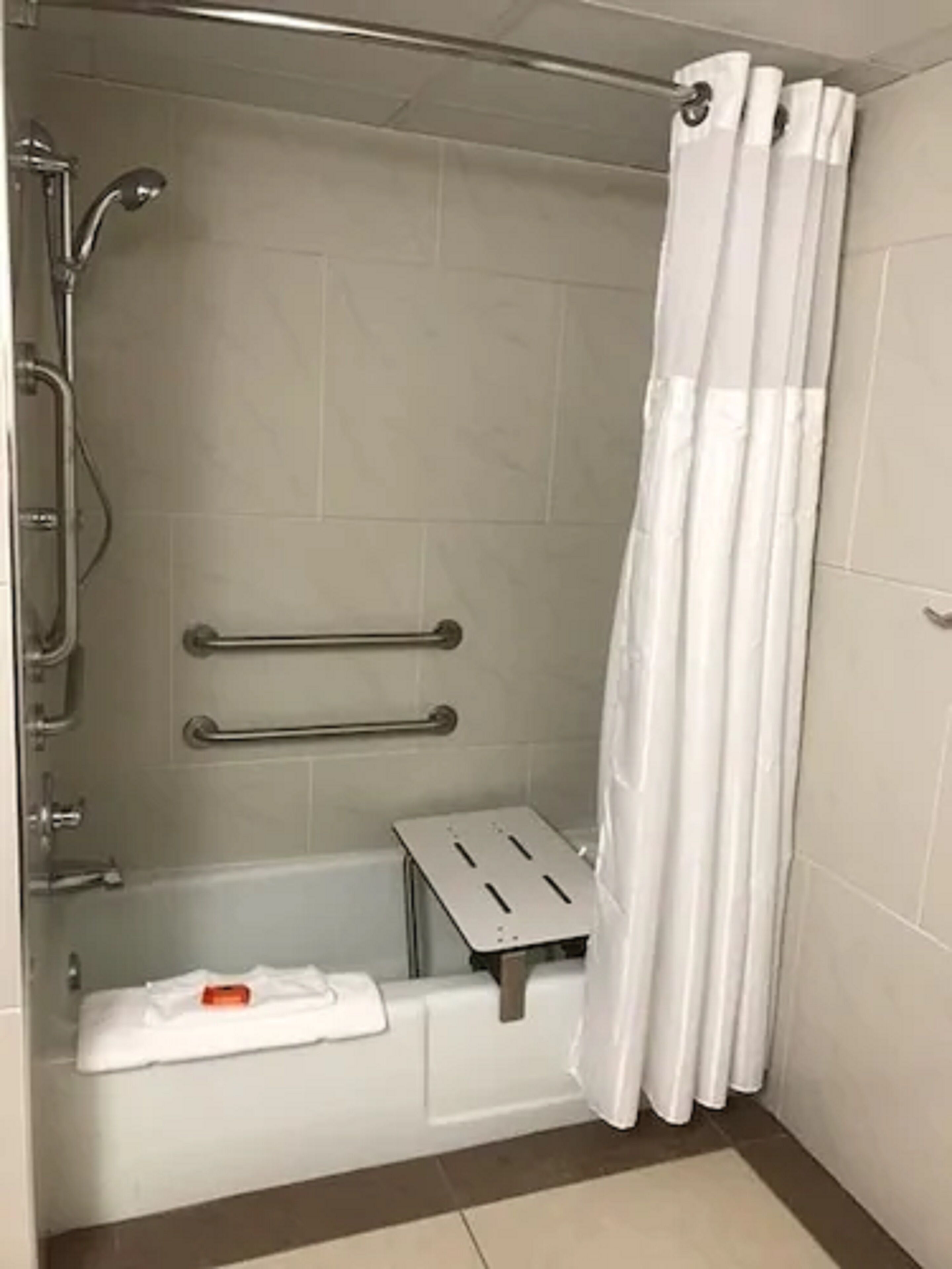 combined shower/bathtub, free toiletries, hair dryer, towels