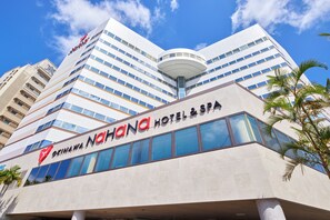 A modern hotel building with a prominent sign reading "ORINAWA NATHANA HOTEL & SPA". - Okinawa NaHaNa Hotel & Spa (Naha)