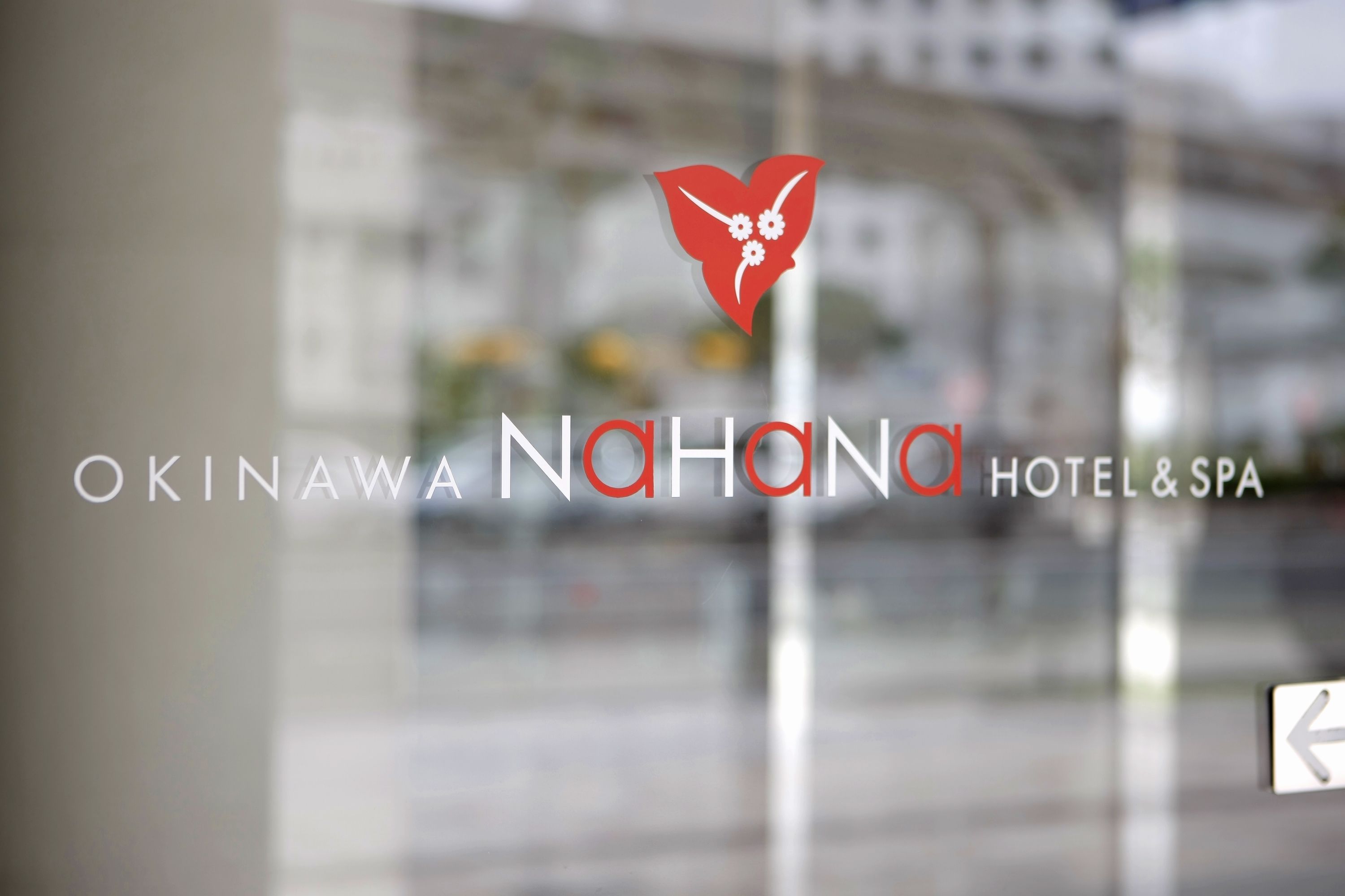 The logo and name of Okinawa Nahona Hotel & Spa.