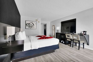 Desk, blackout drapes, iron/ironing board, free cribs/infant beds