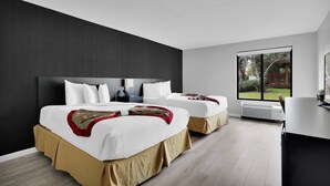 Deluxe Room, 2 Queen Beds, Non Smoking | Desk, blackout curtains, iron/ironing board, free cots/infant beds - Ramada by Wyndham Jacksonville I-95 by Butler Blvd (Jacksonville)