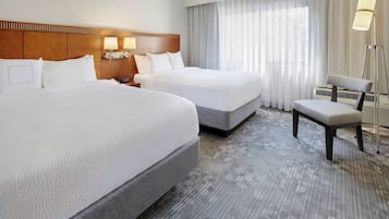 Premium bedding, desk, laptop workspace, iron/ironing board