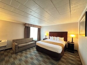 Suite, 1 King Bed and sofa bed, Non Smoking | 1 bedroom, desk, laptop workspace, iron/ironing board