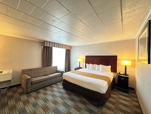 Suite, 1 King Bed and sofa bed, Non Smoking | 1 bedroom, desk, laptop workspace, iron/ironing board