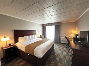 Deluxe Room, 1 King Bed, Refrigerator & Microwave | 1 bedroom, desk, laptop workspace, iron/ironing board