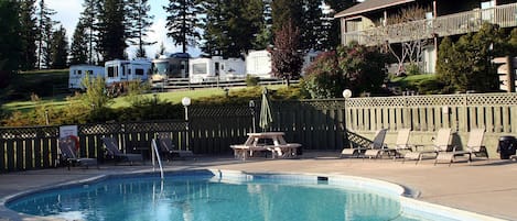 Seasonal outdoor pool, open 8:00 AM to 8:00 PM, sun loungers