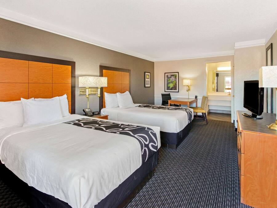 Premium bedding, desk, blackout curtains, iron/ironing board