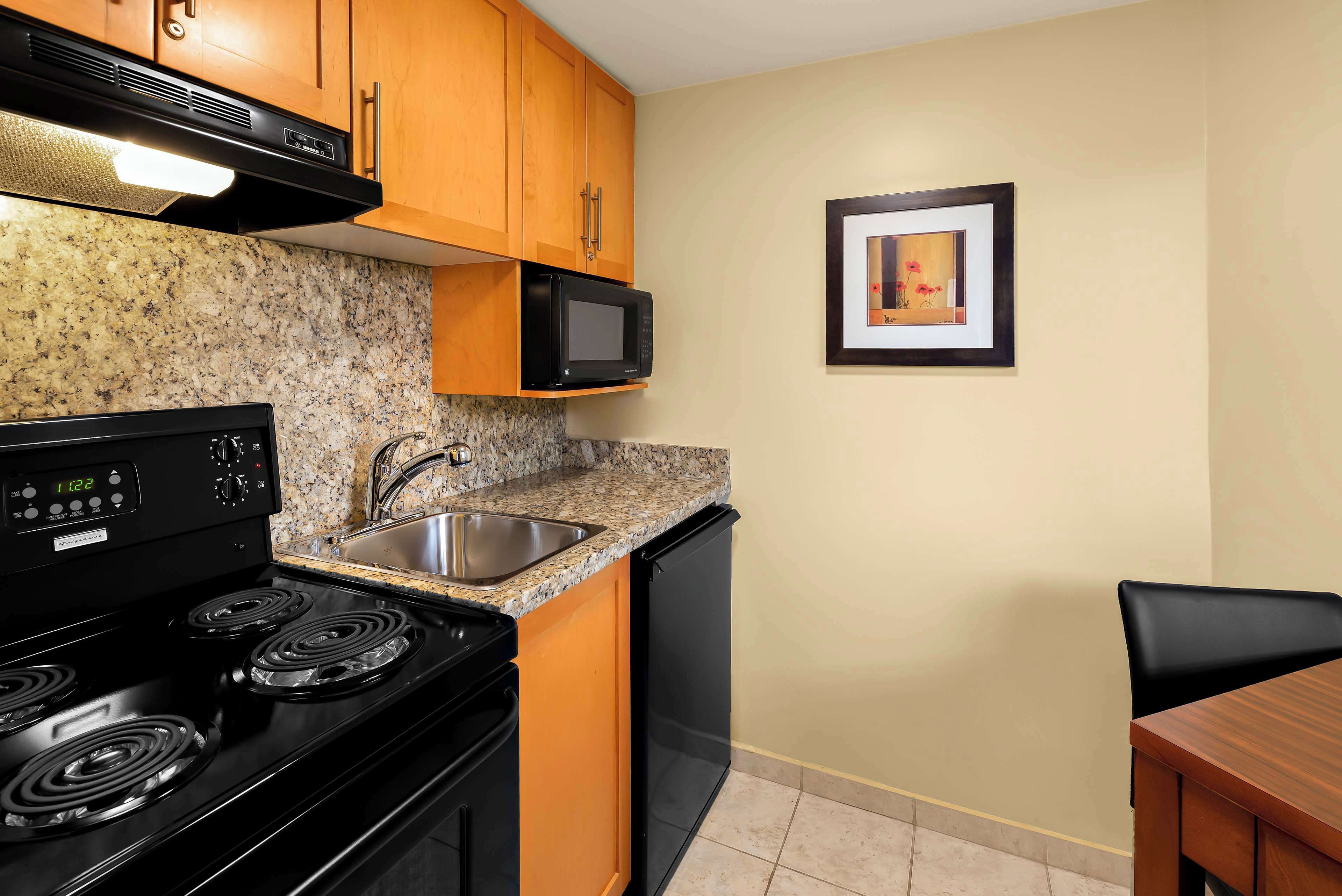 Hypo-allergenic bedding, pillow-top beds, in-room safe, desk