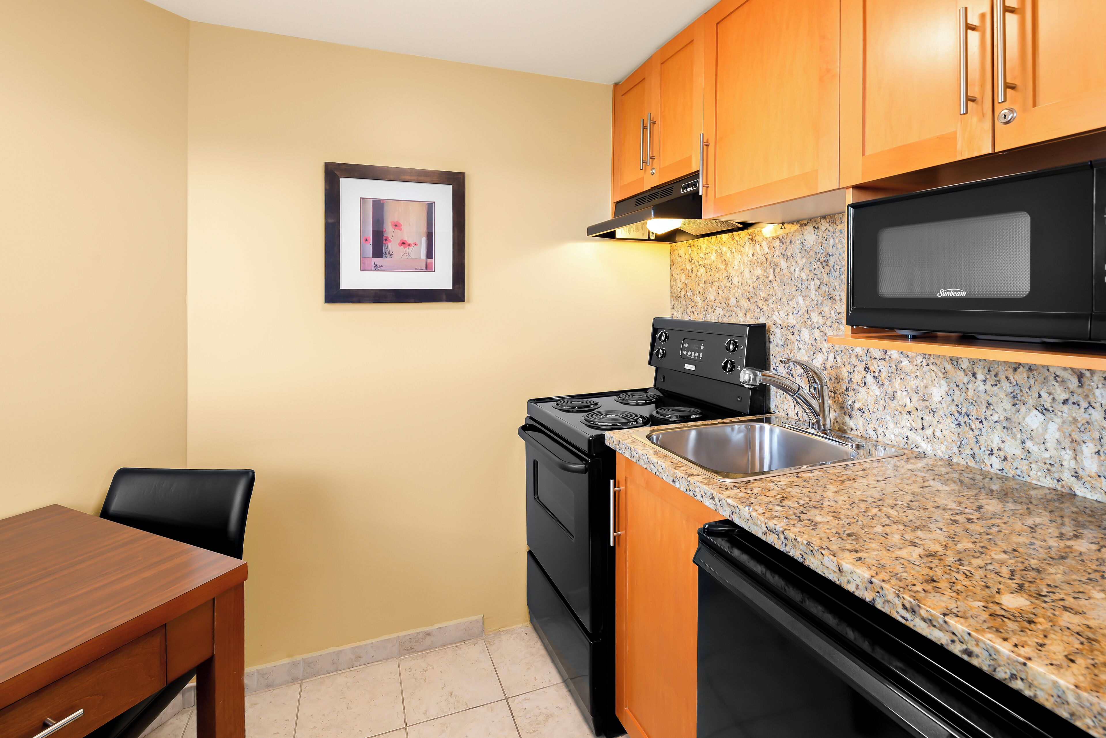 Hypo-allergenic bedding, pillow-top beds, in-room safe, desk