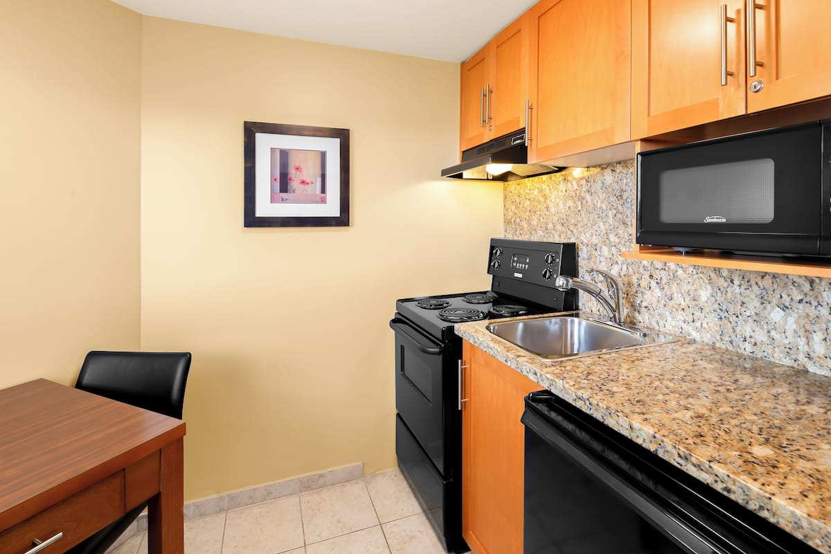 Hypo-allergenic bedding, pillow-top beds, in-room safe, desk